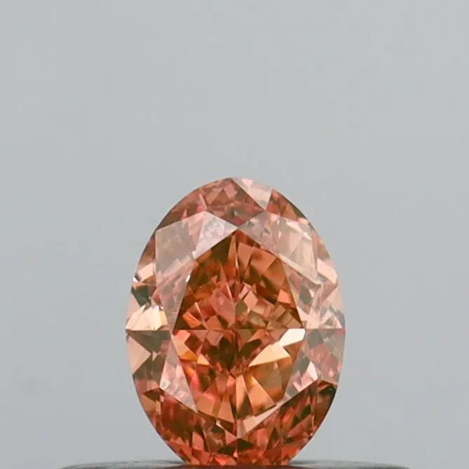 0.31ct Oval Natural Diamond (Colour Fancy Orange, Clarity VVS2, GIA Certified)