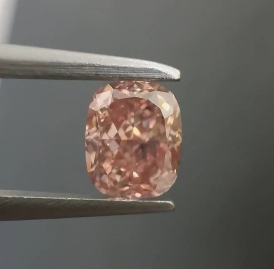 0.51ct Cushion brilliant Natural Diamond (Colour Fancy Orangey Pink, Clarity VS2, GIA Certified)