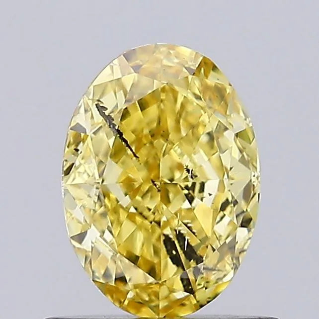 0.71ct Oval Lab Grown Diamond (Colour Fancy Vivid Yellow, Clarity SI2, IGI Certified)