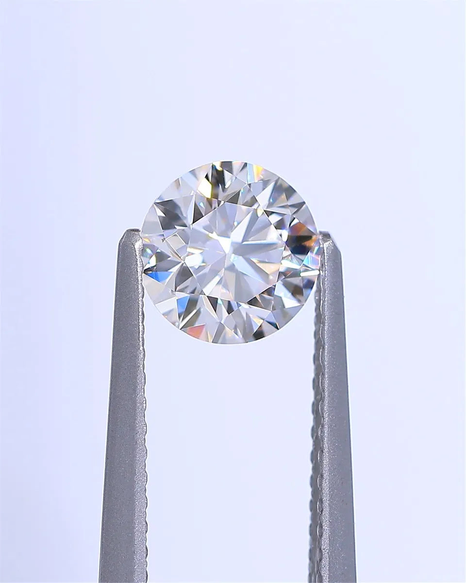 1.00ct Round Natural Diamond (Colour Faint Pink, Clarity VVS2, Cut GD, GIA Certified)