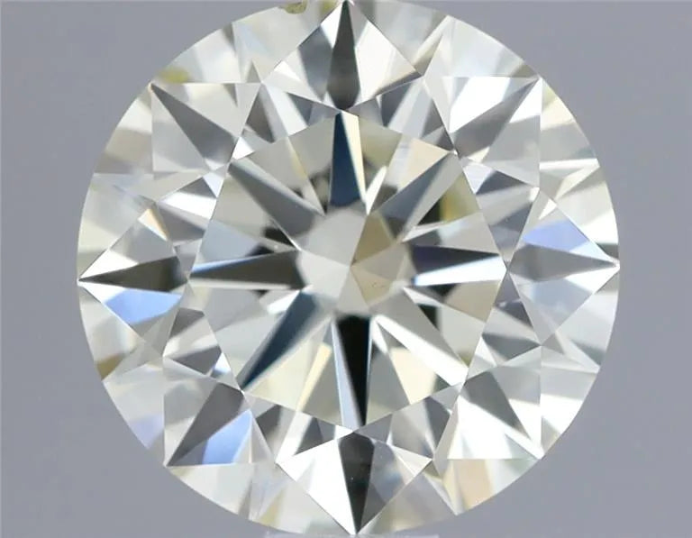0.70ct Round Natural Diamond (Colour M, Clarity VS1, Cut EX, IGI Certified)