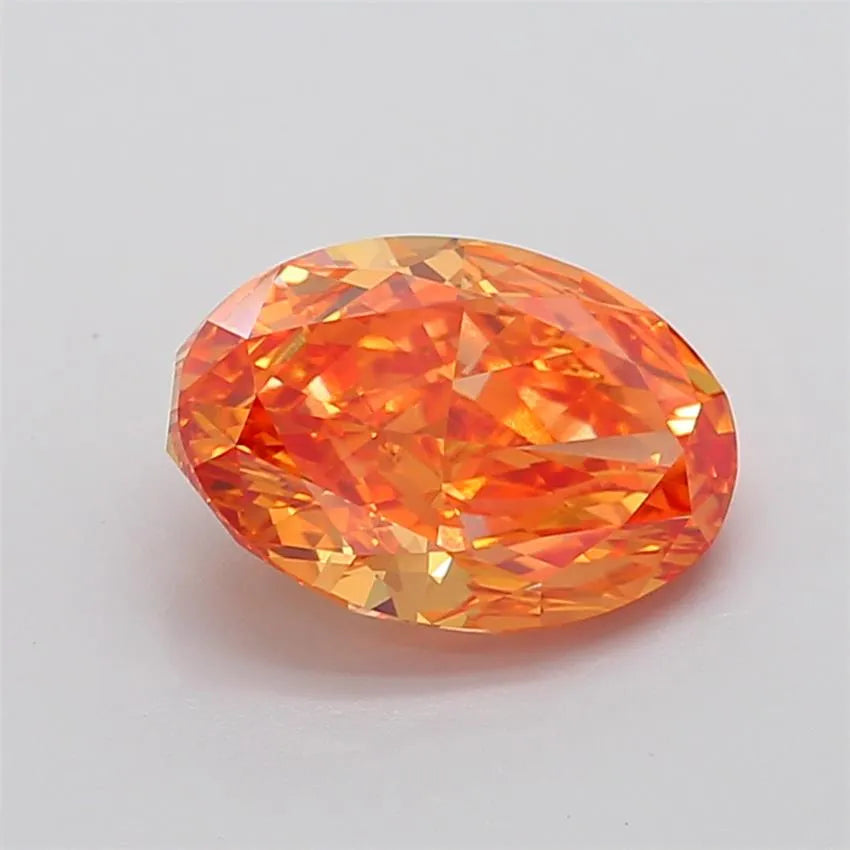 5.24ct Oval Lab Grown Diamond (Colour Fancy Vivid Pinkish Orange, Clarity VVS2, IGI Certified)